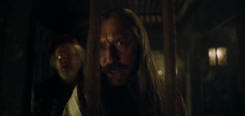 Movie still from “Peter Pan & Wendy” (2023), directed by David Lowery – A person with long hair; Close Up shot, Low angle