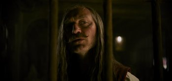 Movie still from “Peter Pan & Wendy” (2023), directed by David Lowery – A person with long hair; Close Up shot, Low angle