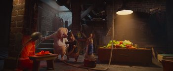 Movie still from “Peter Rabbit 2: The Runaway” (2021), directed by Will Gluck – A group of stuffed animals in a living room; Wide shot, Low angle