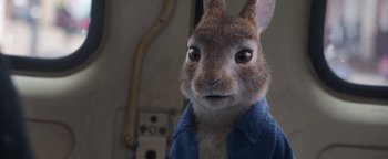 Movie still from “Peter Rabbit 2: The Runaway” (2021), directed by Will Gluck – A rabbit wearing a blue shirt; Close Up shot, Over the shoulder angle