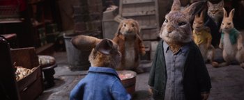 Movie still from “Peter Rabbit 2: The Runaway” (2021), directed by Will Gluck – A group of stuffed animals that are standing in a room; Medium shot, Over the shoulder angle