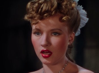 Movie still from “Phantom of the Opera” (1943), directed by Arthur Lubin – A person wearing a dress; Close Up shot, High angle