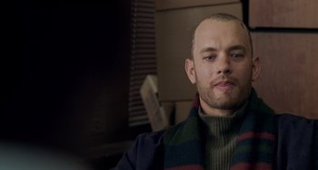 Movie still from “Philadelphia” (1993), directed by Jonathan Demme – A person wearing a sweater; Close Up shot, Low angle