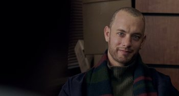 Movie still from “Philadelphia” (1993), directed by Jonathan Demme – A person wearing a scarf; Close Up shot, Low angle