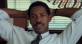 Movie still from “Philadelphia” (1993), directed by Jonathan Demme – A man in a white dress shirt and a tie; Close Up shot, Low angle