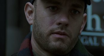 Movie still from “Philadelphia” (1993), directed by Jonathan Demme – A man's face with a beard; Close Up shot, Low angle