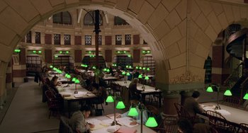Movie still from “Philadelphia” (1993), directed by Jonathan Demme – A group of people sitting at tables in a room; Extreme Wide shot, High angle