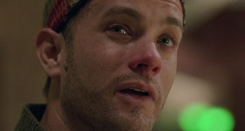 Movie still from “Philadelphia” (1993), directed by Jonathan Demme – A person with a hat on; Close Up shot, Overhead angle