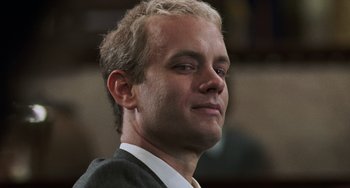 Movie still from “Philadelphia” (1993), directed by Jonathan Demme – A person wearing a suit and tie; Close Up shot, Low angle