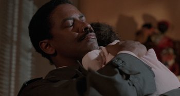 Movie still from “Philadelphia” (1993), directed by Jonathan Demme – A man and a child in a room; Close Up shot, Low angle