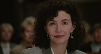 Movie still from “Philadelphia” (1993), directed by Jonathan Demme – A person wearing a suit; Close Up shot, Over the shoulder angle