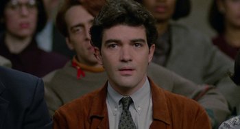 Movie still from “Philadelphia” (1993), directed by Jonathan Demme – A person wearing a suit and tie; Close Up shot, Over the shoulder angle