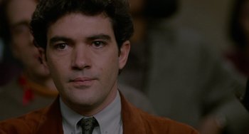 Movie still from “Philadelphia” (1993), directed by Jonathan Demme – A person wearing a suit and tie; Close Up shot, High angle
