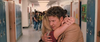 Movie still from “Pineapple Express” (2008), directed by David Gordon Green – A man and a woman hugging in a hallway; Medium shot, Over the shoulder angle