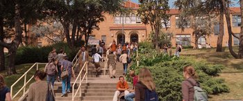 Movie still from “Pineapple Express” (2008), directed by David Gordon Green – A group of people walking down a set of stairs; Extreme Wide shot, High angle