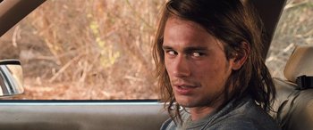 Movie still from “Pineapple Express” (2008), directed by David Gordon Green – A person sitting in a car; Close Up shot, Over the shoulder angle
