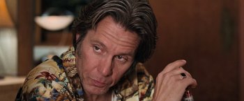 Movie still from “Pineapple Express” (2008), directed by David Gordon Green – A person with long brown hair; Close Up shot, Over the shoulder angle