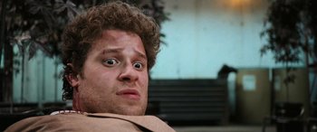 Movie still from “Pineapple Express” (2008), directed by David Gordon Green – A person with curly hair; Close Up shot, Low angle