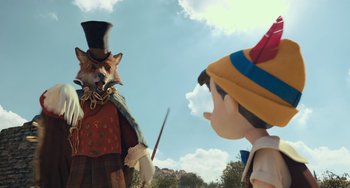 Movie still from “Pinocchio” (2022), directed by Robert Zemeckis – A person dressed up as a fox and a pinocchio; Medium shot, Over the shoulder angle
