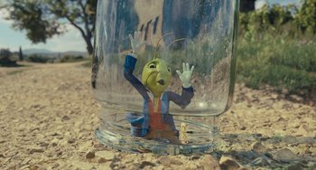 Movie still from “Pinocchio” (2022), directed by Robert Zemeckis – A jar that is sitting on the ground; Wide shot, High angle