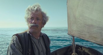 Movie still from “Pinocchio” (2022), directed by Robert Zemeckis – An older man with a beard and a mustache on a boat; Close Up shot, Low angle