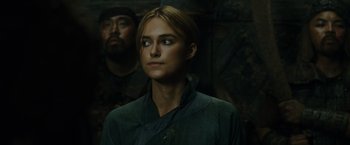 Movie still from “Pirates of the Caribbean: At World's End” (2007), directed by Gore Verbinski – A person wearing a green shirt; Close Up shot, Over the shoulder angle
