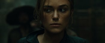 Movie still from “Pirates of the Caribbean: At World's End” (2007), directed by Gore Verbinski – A person with long brown hair; Close Up shot, Over the shoulder angle