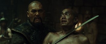 Movie still from “Pirates of the Caribbean: At World's End” (2007), directed by Gore Verbinski – Two men are standing next to each other; Close Up shot, Low angle