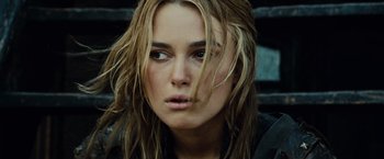 Movie still from “Pirates of the Caribbean: At World's End” (2007), directed by Gore Verbinski – A person with wet hair; Close Up shot, Over the shoulder angle