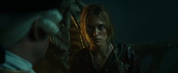 Movie still from “Pirates of the Caribbean: At World's End” (2007), directed by Gore Verbinski – A young woman is staring into the camera; Close Up shot, Over the shoulder angle