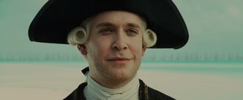 Movie still from “Pirates of the Caribbean: At World's End” (2007), directed by Gore Verbinski – A person wearing a hat and looking at the camera; Close Up shot, Low angle