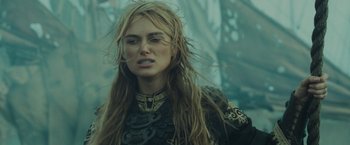 Movie still from “Pirates of the Caribbean: At World's End” (2007), directed by Gore Verbinski – A person with long blonde hair; Close Up shot, Over the shoulder angle