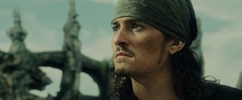 Movie still from “Pirates of the Caribbean: At World's End” (2007), directed by Gore Verbinski – A person wearing a bandana; Close Up shot, Low angle