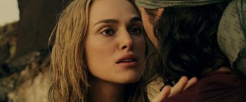 Movie still from “Pirates of the Caribbean: At World's End” (2007), directed by Gore Verbinski – A person with long brown hair; Close Up shot, Over the shoulder angle