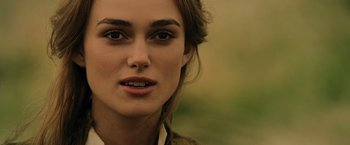 Movie still from “Pirates of the Caribbean: At World's End” (2007), directed by Gore Verbinski – A woman's face in a field; Close Up shot, Over the shoulder angle