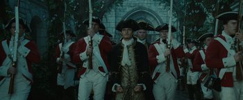 Movie still from “Pirates of the Caribbean: Dead Man's Chest” (2006), directed by Gore Verbinski – A group of men dressed in period costumes holding swords; Medium shot, Low angle