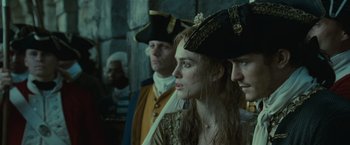 Movie still from “Pirates of the Caribbean: Dead Man's Chest” (2006), directed by Gore Verbinski – A group of people standing next to each other; Close Up shot, Over the shoulder angle