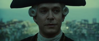 Movie still from “Pirates of the Caribbean: Dead Man's Chest” (2006), directed by Gore Verbinski – A person wearing a wig; Close Up shot, Low angle