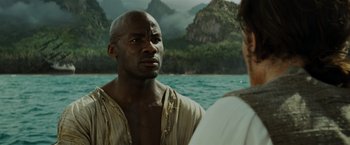 Movie still from “Pirates of the Caribbean: Dead Man's Chest” (2006), directed by Gore Verbinski – A man in a white shirt and a woman in a white dress; Close Up shot, Over the shoulder angle