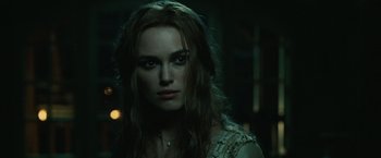 Movie still from “Pirates of the Caribbean: Dead Man's Chest” (2006), directed by Gore Verbinski – A person with long brown hair; Close Up shot, Over the shoulder angle