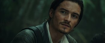 Movie still from “Pirates of the Caribbean: Dead Man's Chest” (2006), directed by Gore Verbinski – A person with long hair; Close Up shot, Over the shoulder angle