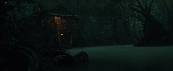 Movie still from “Pirates of the Caribbean: Dead Man's Chest” (2006), directed by Gore Verbinski – A house in the middle of the night in the woods; Extreme Wide shot, Low angle