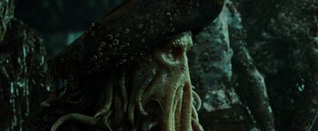 Movie still from “Pirates of the Caribbean: Dead Man's Chest” (2006), directed by Gore Verbinski – An octopus wearing a pirate's hat; Close Up shot, Over the shoulder angle