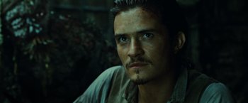 Movie still from “Pirates of the Caribbean: Dead Man's Chest” (2006), directed by Gore Verbinski – A person wearing a shirt; Close Up shot, Low angle