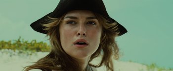 Movie still from “Pirates of the Caribbean: Dead Man's Chest” (2006), directed by Gore Verbinski – A person wearing a hat; Close Up shot, Low angle