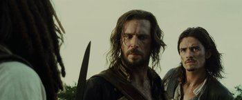 Movie still from “Pirates of the Caribbean: Dead Man's Chest” (2006), directed by Gore Verbinski – A person with long hair and a beard; Close Up shot, Low angle
