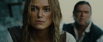 Movie still from “Pirates of the Caribbean: Dead Man's Chest” (2006), directed by Gore Verbinski – A person with wet hair; Close Up shot, Over the shoulder angle
