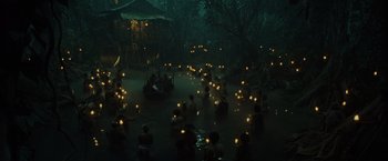 Movie still from “Pirates of the Caribbean: Dead Man's Chest” (2006), directed by Gore Verbinski – A group of people floating in a pond at night; Extreme Wide shot, High angle