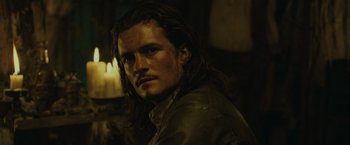 Movie still from “Pirates of the Caribbean: Dead Man's Chest” (2006), directed by Gore Verbinski – A person with long brown hair; Close Up shot, Over the shoulder angle