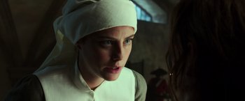Movie still from “Pirates of the Caribbean: Dead Men Tell No Tales” (2017), directed by Espen Sandberg – A woman wearing a white hat looking at the camera; Close Up shot, Over the shoulder angle